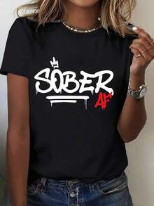 Recomiendo encarecidamente la camiseta casual para mujer con estampado de grafiti 'Sober' - Cuello redondo, manga corta, blanca, cómoda para todas las estaciones, perfecta para actividades al aire libre y como regalo para las fiestas, camiseta de regalo de estilo casual vanguardista, tela suave, fácil de combinar. - Negro - Ver 7