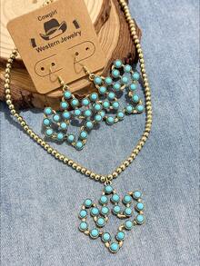 Bộ dây chuyền đá Turquoise hình cây xương rồng rỗng theo phong cách Bohemian cổ điển châu Âu và Mỹ. Được thiết kế dựa trên họa tiết cây xương rồng rỗng, với nhiều hạt đá Turquoise tròn được xâu chuỗi với nhau, kết hợp với khung kim loại mài mòn và dây chuyền hạt. Có các lựa chọn màu sắc: đồng cổ - trắng Turquoise, vàng cổ - xanh Turquoise và bạc cổ - xanh Turquoise, thể hiện hoàn hảo phong cách miền Tây. Thiết kế tổng thể nhẹ nhàng và năng động, toát lên vẻ sang trọng cổ điển. - Cây xương rồng nhiều màu - Xem 12