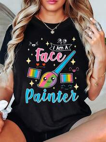 Camiseta de Diseño Simple y Versátil, soy pintor de rostros. Estampada con pinceles coloridos y motivos de estrellas, esta camiseta negra de manga corta y cuello redondo es lavable a máquina, adecuada para primavera, verano y otoño. Presenta un estilo casual, un ajuste cómodo, un diseño moderno, es versátil para el uso diario, está hecha de tela suave y es una camiseta de algodón a la moda. - Negro - Ver 1