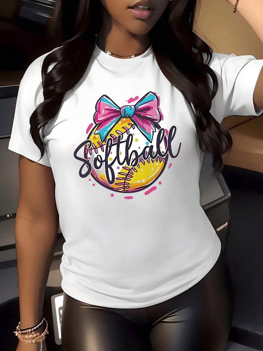 A Yellow Softball With Pink Stitching And A Large Blue And Pink Bow Symbolizes Sporting Passion And Feminine Energy. A Comfortable, Casual Women's T-Shirt For Everyday Wear. - 白色 - 查看 1