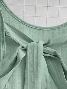 Vestido casual mini de mujer con tirantes de amarre, espalda descubierta, sin mangas, corte evasé y dobladillo con volantes - Verde 2 - Ver 6