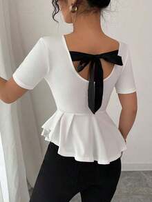 Elegante blusa de punto jacquard con lunares, lazo en la espalda, cintura ceñida y bajo asimétrico - Blanco - Ver 6