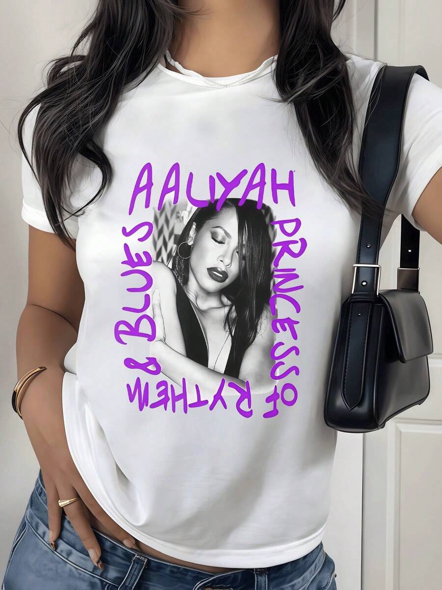 Figura artística en tonos monocromáticos que expresa fuerza femenina y estilo urbano con letras violeta que transmiten energía y libertad camiseta de mujer moderna para uso casual y elegante - Blanco - Ver 1