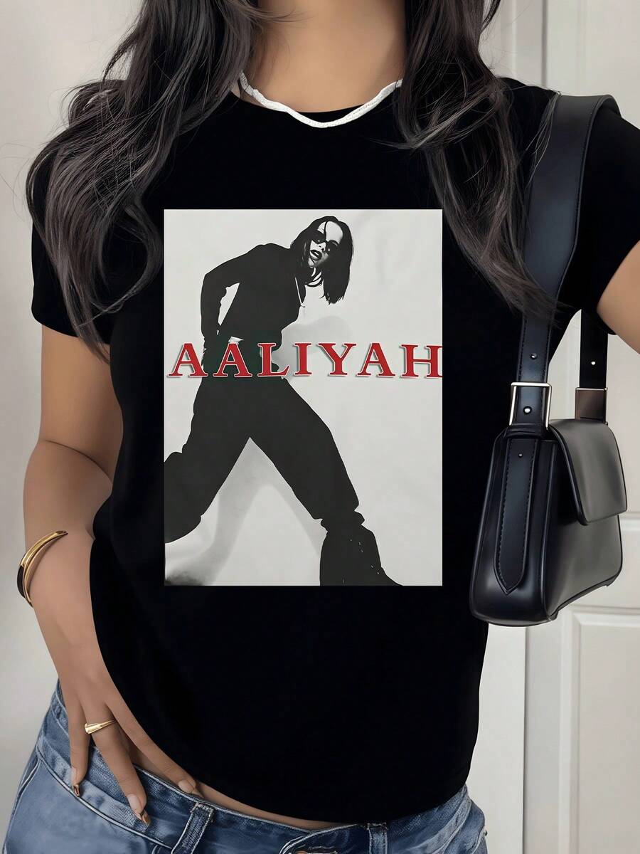 Figura femenina en actitud poderosa transmite energía confianza y estilo urbano expresando una presencia fuerte y moderna ideal para mujeres con carácter y personalidad camiseta de mujer casual cómoda y moderna - Negro - Ver 1