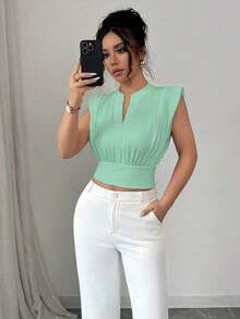 Nueva camiseta sin mangas ajustada para mujer con cuello alto de punto, media cremallera frontal y estilo informal - verde menta - Ver 1