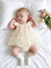 Pelele de manga corta con volantes de tul esponjoso y lazo 3D en estilo princesa etérea para bebés niñas en color blanco crema - Albaricoque - Ver 3