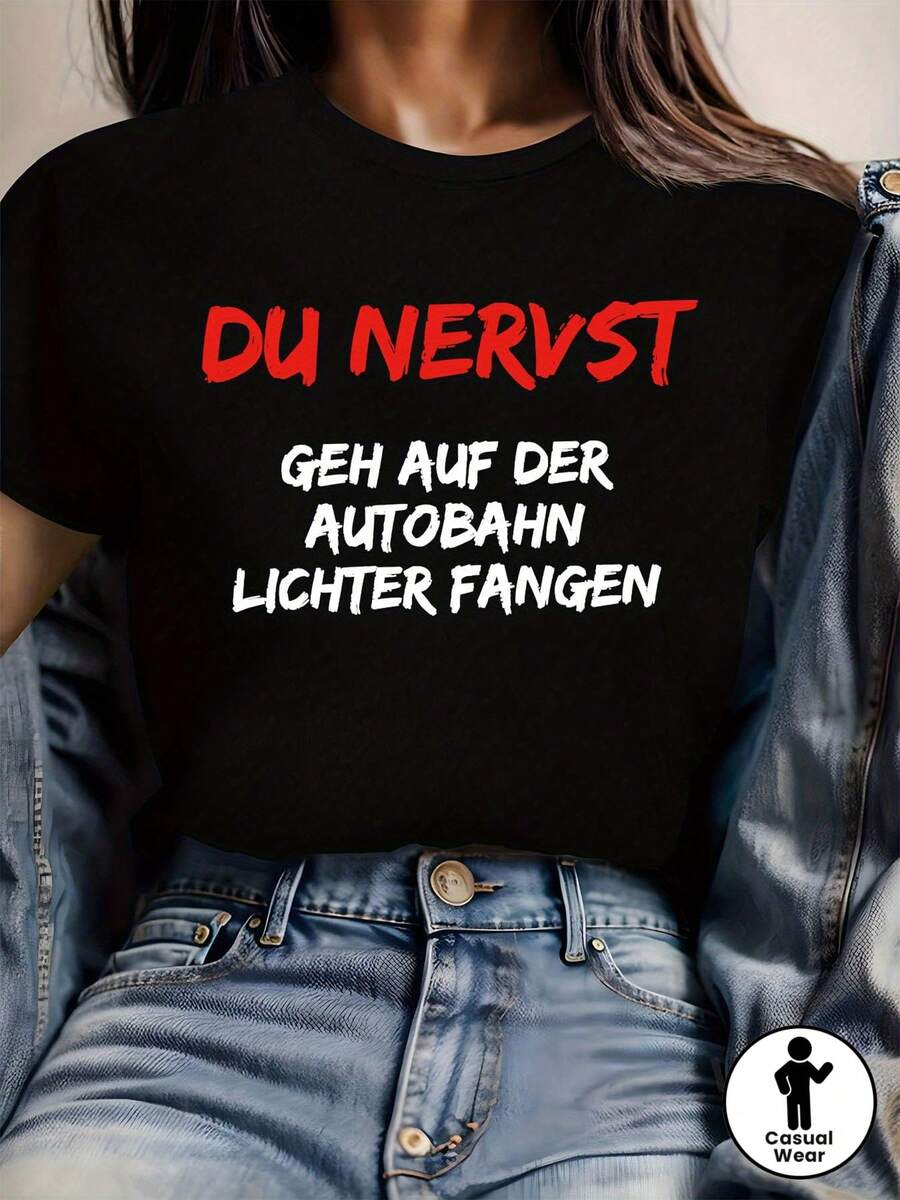 Texto en alemán "DU NERVST GEH AUF DER AUTOBAHN LICHTER FANGEN" impreso en una camiseta moderna e informal de cuello redondo para mujer, ideal para primavera-verano. - Negro - Ver 1
