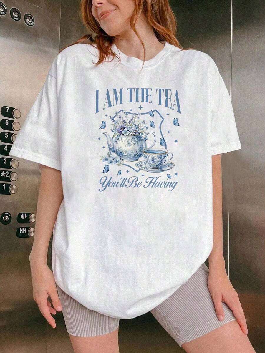 Camiseta de mujer con estampado floral azul inspirado en un juego deé, cuello redondo regular, blanca, ligera, informal para primavera y verano, diseño de fantasía vacacional y citaónica - lavable aáquina, ropa casual cómoda y para fiestas de vacaciones - camiseta blanca regular - Camiseta unisex de algodón suelto de manga corta y cuello redondo, estilo vintage urbano. - Blanco - Ver 1