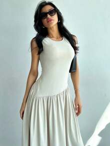 Vestido largo de mujer sin mangas, de color liso y cuello redondo, nuevo estilo veraniego, corte ajustado y favorecedora falda larga con diseño de retazos. - amarillo ganso - Ver 1