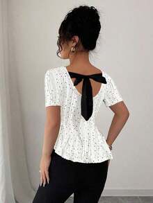 Elegante blusa de punto jacquard con lunares, lazo en la espalda, cintura ceñida y bajo asimétrico - Multicolor - Ver 5