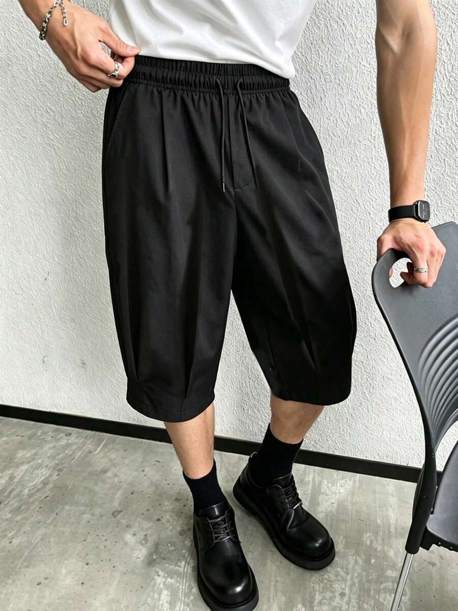 男士夏季寬鬆七分短褲 1件,鬆緊腰帶附抽繩,舒適極簡設計,適合戶外活動與運動 - 黑色 - 查看 1