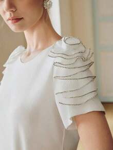 Blusa elegante de manga corta con cuello redondo y adorno floral 3D para mujer, nueva llegada del verano 2026 - Blanco - Ver 8
