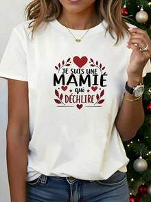 Camiseta moderna y minimalista para mujer, con el texto en francés "JE SUIS UNE MAMIÉ qui DéCHIRE" impreso, decorada con una corona, camiseta blanca de manga corta estampada, estilo casual, diseño a la moda, versátil para el uso diario, estilo moderno, informal para el día a día. - Blanco - Ver 1
