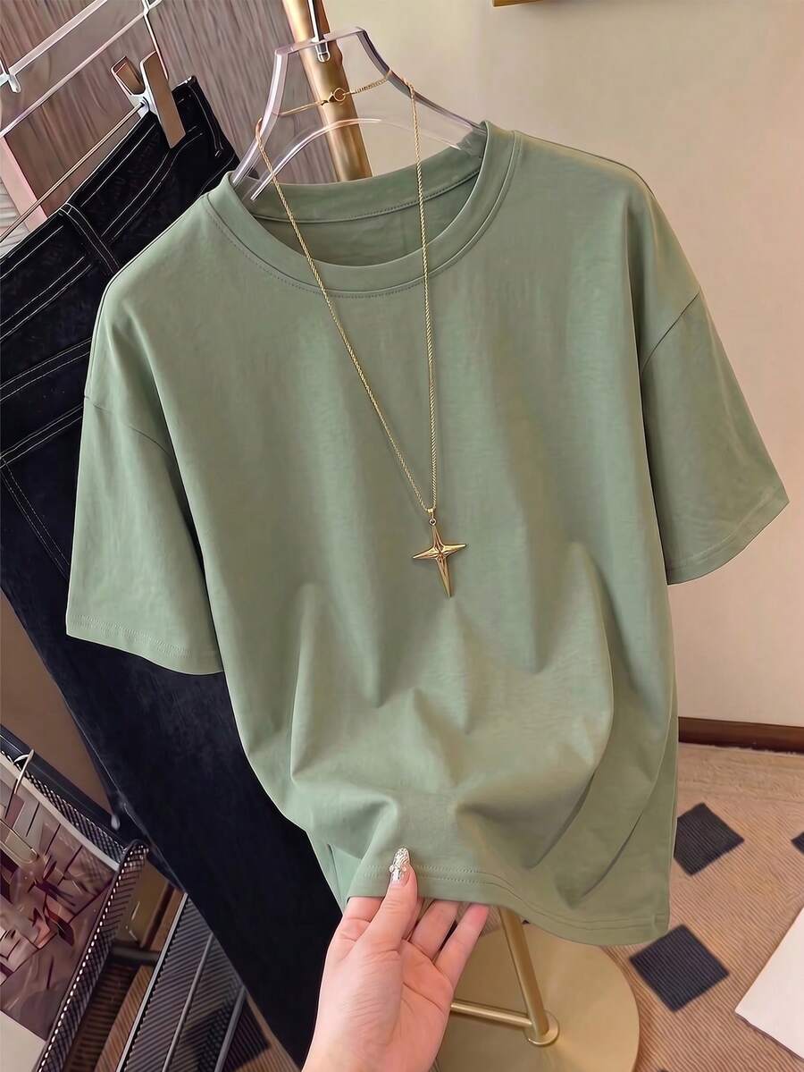 Áo thun nữ tay ngắn cổ tròn dáng rộng mùa hè, kiểu dáng thời trang, đa năng, thoải mái, mới lạ. - màu xanh lá - Xem 1