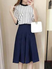 Juego de dos piezas para mujeres Conjunto de pantalones acampanados tres cuartos para mujer, nuevo estilo de moda de otoño, versión coreana, holgado y casual, conjunto de dos piezas con manga corta - Blanco - Ver 4