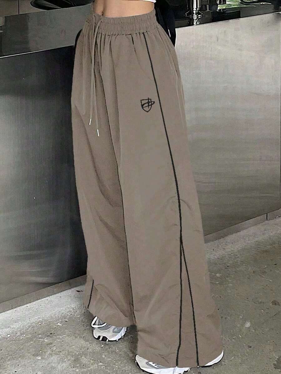 Pantalones casuales de pierna ancha con cordón en contraste y ribeteamionto - Caqui - Ver 1