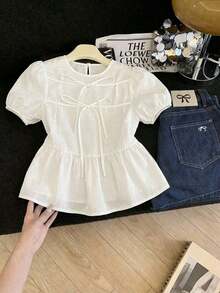 Blusa con volantes y mangas abullonadas con lazo en la parte delantera - Blanco - Ver 1