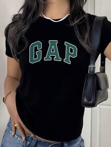 Large Green Letters Symbolizing Energy, Confidence, And Freshness On A White Background That Conveys Purity And Minimalism. A Modern, Comfortable, Casual Women's T-Shirt For Everyday Wear. - 黑色 - 查看 1