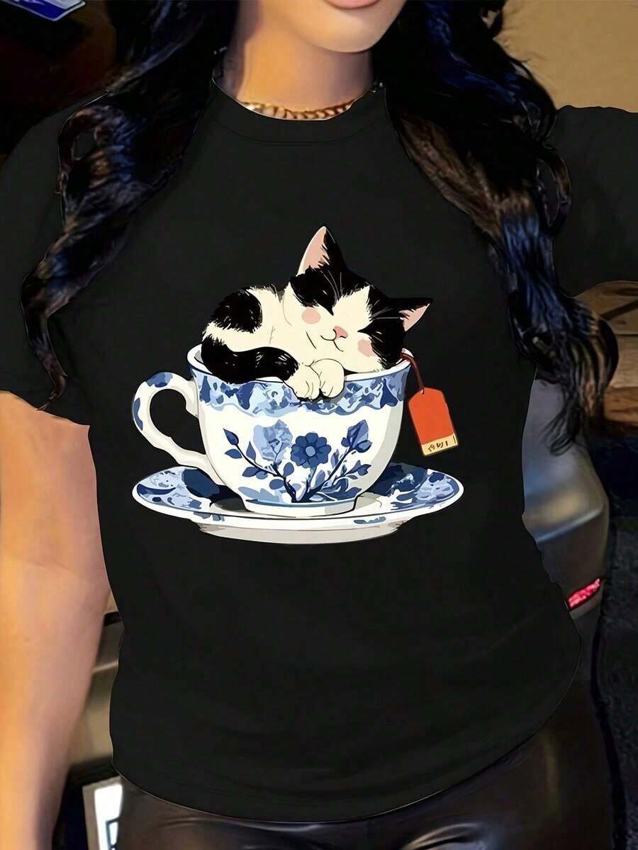ropa de mujer Camiseta de mujer - Lindo diseño de gato durmiendo en taza de té con estampado floral - Atuendo ligero e informal para el día a día y vacaciones - Corte regular, top - Negro - Ver 1