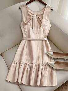 Vestido casual mini de mujer con tirantes de amarre, espalda descubierta, sin mangas, corte evasé y dobladillo con volantes - Albaricoque 2 - Ver 2