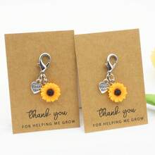 1 móc khóa hình hoa hướng dương "Cảm ơn thầy cô đã giúp em trưởng thành" - Quà tặng tri ân thầy cô. - Bạc - Xem 2