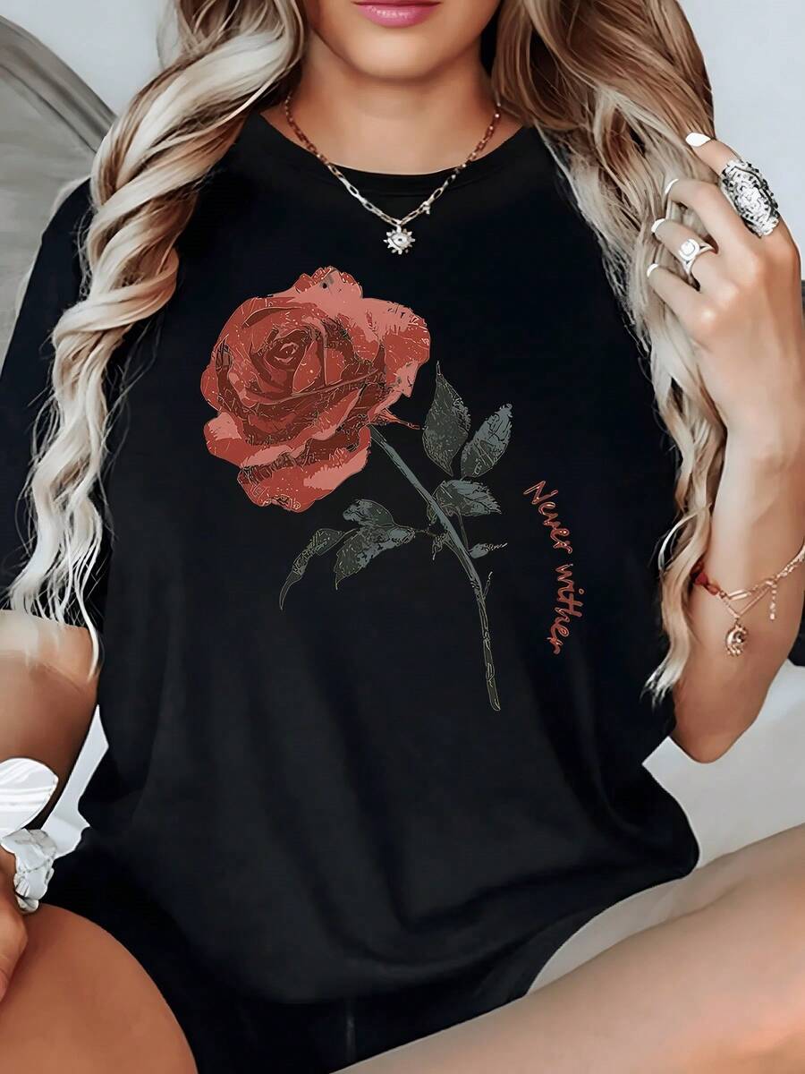 A Red Rose With Delicate Petals Symbolizing Eternal Love And Inner Strength, Accompanied By Lettering That Inspires Hope And Renewal. A Modern, Comfortable, Casual Women's T-Shirt For Everyday Wear. - 黑色 - 查看 1
