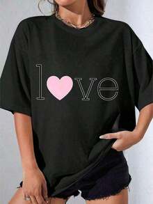 Conjuntos de San Valentín para Mujer 2026, Camiseta Blanca y Negra para Mujer, Camiseta Oversize con Estampado de Corazón, Blanca para Uso Casual y Atuendos Diarios, Camiseta Estampada Casual para Fiesta al Aire Libre, Ropa de Mujer a la Moda, Vestido , Ropa de San Valentín, Blusas para Mujer, Camisetas Gráficas de Verano para Mujer, Camiseta Casual Estampada para Mujer, Manga Corta y Cuello Redondo, Moda Urbana Local de Primavera/Verano. - Negro - Ver 1
