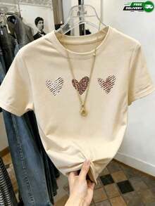 2026 New Cotton-shirtCamiseta de manga corta para mujer, adecuada para uso diario, citas, salidas casuales, paseos urbanos y fines de semana, con estampado de tres corazones pequeños con patrones de rayas, leopardo y trazos de pincel, cuello redondo, sin bolsillos, sin cremalleras, sin botones, fabricada en poliéster, estilo casual minimalista y dulce, para primavera y verano. Envío nacional.Lightweight Cotton - Albaricoque - Ver 7