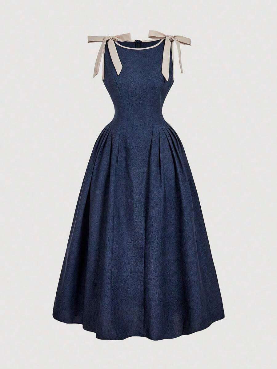 Vestido color albaricoque con cuello redondo, sin mangas, con ribete de contraste, lazo decorativo en la cintura y bajo acampanado - Azul marino - Ver 1