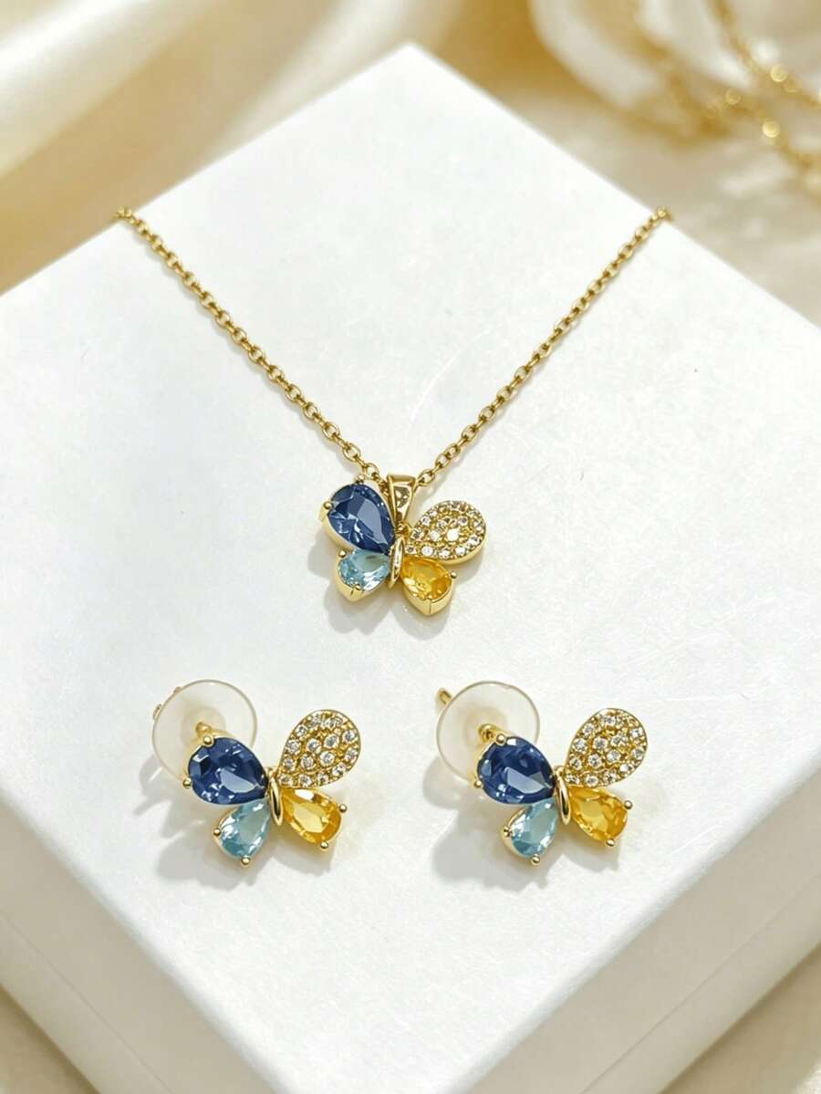 一套不锈钢立方氧化锆蝴蝶吊坠项链和耳环，百搭奢华优雅节日设计首饰套装，礼品 - 金色 - 查看 1