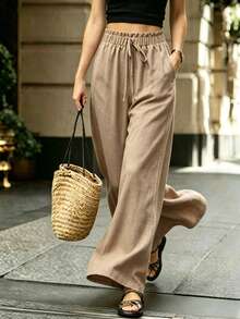 Quần ống rộng nữ màu kaki xếp ly, cạp chun co giãn, chất liệu giả vải lanh, kiểu dáng suông, có dây rút, dáng rộng thoải mái, dễ mặc hàng ngày. - Màu Khaki - Xem 6