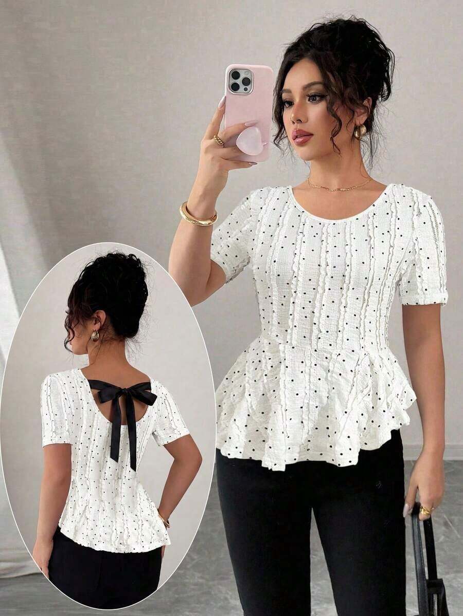 Elegante blusa de punto jacquard con lunares, lazo en la espalda, cintura ceñida y bajo asimétrico - Multicolor - Ver 1