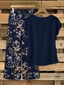 Clasi Conjunto de 2 piezas de blusa con moño elegante y minimalista en color rosa, combinada con pantalones de pierna ancha con estampado floral, adecuado para el verano - Azul marino - Ver 2