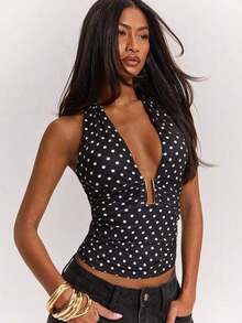 Top halter corto con espalda descubierta y nudo delantero, de tela texturizada y unicolor, para mujer, ideal para vacaciones en la playa - Negro - Ver 1