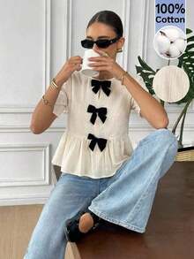 Camisa de mujer con cuello redondo, manga corta, decoración de lazo y bajo con volantes - Albaricoque - Ver 9