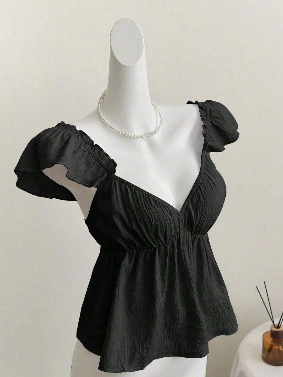 Top corto de camisola con escote bajo y espalda descubierta, con manga tipo gorra y volantes en azul, diseño sexy - Negro - Ver 1