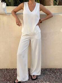 Conjunto de verano de dos piezas para mujer de PoPoHouse, con top blanco de escote en V sin mangas y pantalones anchos de cintura alta para playa, vacaciones, fiestas, salidas y elegante - Blanco - Ver 4