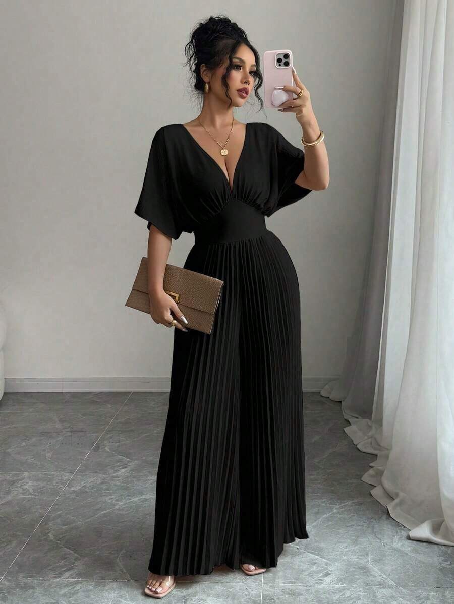 Mono de mujer elegante con cuello en V profundo, mangas tipo murciélago y plisados, de unicolor - Negro - Ver 1