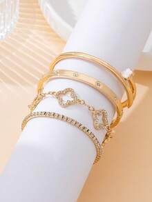 Bộ 4 vòng tay hình cỏ bốn lá rỗng sang trọng, thanh lịch, sáng bóng và tinh tế dành cho nữ. - Vàng - Xem 4