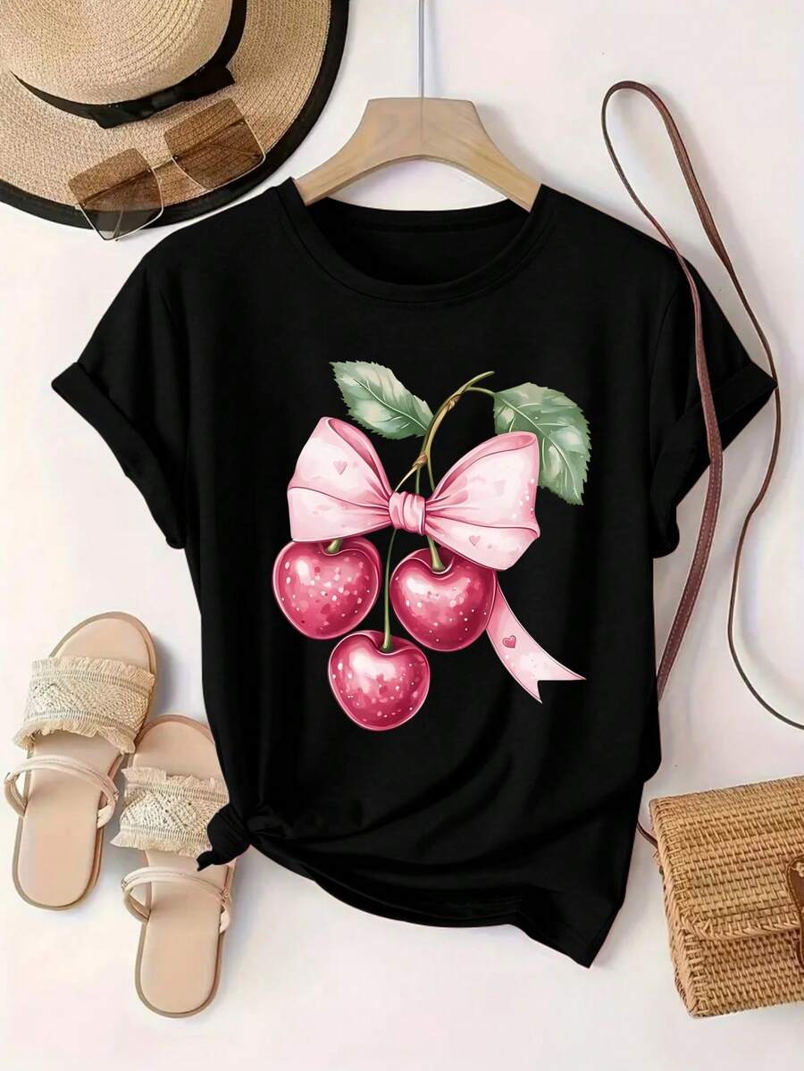 New Women's T-Shirt For All Seasons, Featuring A Round Neck And Short Sleeves, Decorated With Three Pink Cherries, A Pink Heart-Shaped Bow, And Green Leaves. The Colors Are Sweet And Soft, And The Style Is Cute And Delicate, With A Romantic And Sweet Print Design. - 黑色 - 查看 1