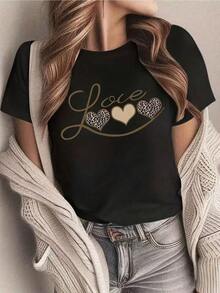 1 pieza. Opción popular para camisetas casuales de cuello redondo para mujer, con corte regular y diseño de corazón de leopardo, perfecta para el verano. 100% algodón. - Negro - Ver 1