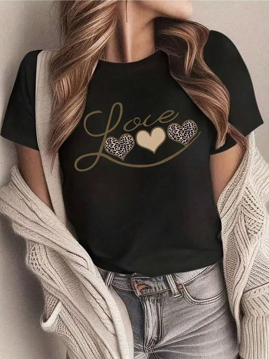 1 pieza. Opción popular para camisetas casuales de cuello redondo para mujer, con corte regular y diseño de corazón de leopardo, perfecta para el verano. 100% algodón. - Negro - Ver 1