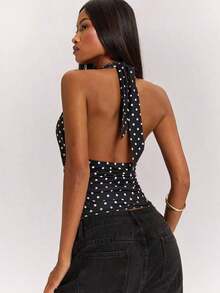 Top halter corto con espalda descubierta y nudo delantero, de tela texturizada y unicolor, para mujer, ideal para vacaciones en la playa - Negro - Ver 2