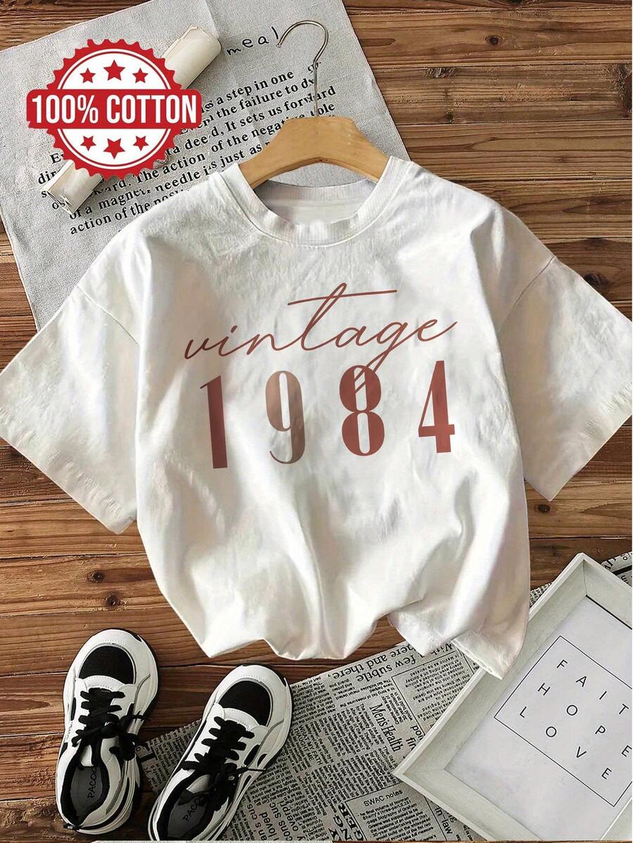Camiseta casual de manga corta y cuello redondo, 100% algodón, con estampado estilo retro de 1984, adecuada para verano y primavera, ropa de mujer. - Blanco - Ver 1
