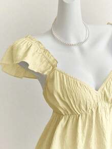Top corto de camisola con escote bajo y espalda descubierta, con manga tipo gorra y volantes en azul, diseño sexy - Amarillo - Ver 6