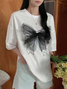 Camiseta de mujer moderna, informal, para fiestas y para estar en casa, 100% algodón, corte holgado. Vintage Camiseta de manga corta con holgura y estampado 3D de lazo para el Día de San Valentín para mujer, camiseta gráfica de verano con diseño sobredimensionadoFashion - Negro - Ver 4