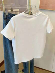 Camiseta de mujer de manga corta y cuello redondo con bordado de lentejuelas en forma de lazo, 56% algodón, estilo minimalista de moda, regalo para amigos - Blanco 5 - Ver 2