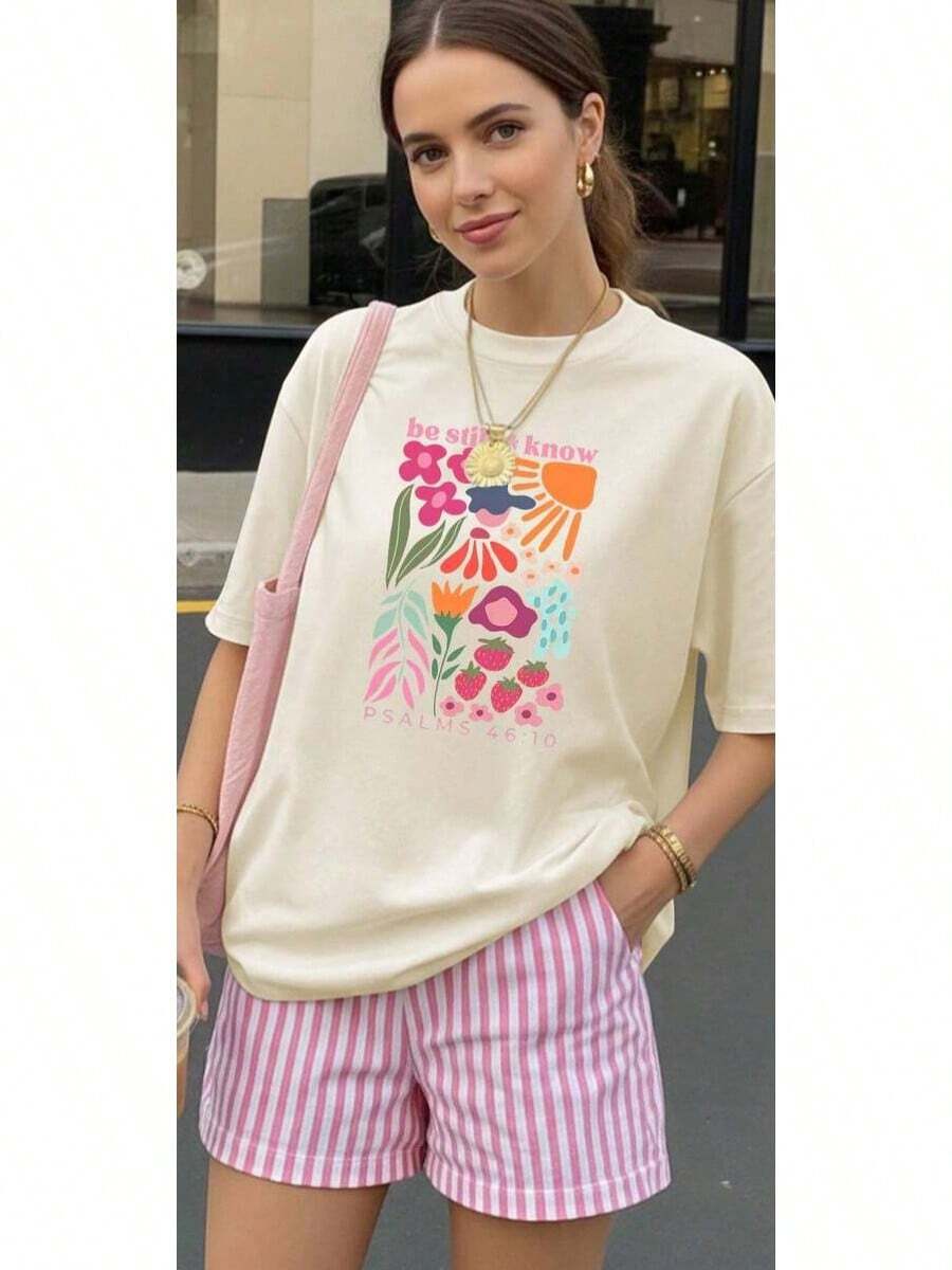 Una camiseta de manga corta para mujer con estilo retro americano, de diseño holgado y estampado (los pantalones son solo sugerencias de estilo). Este artículo sencillo y elegante presenta patrones de texto con temática tropical, siendo un elemento imprescindible para crear un estilo relajado de vacaciones. Es muy adecuado para ocasiones como el Día del Trabajo y el Día de la Independencia de México. La gruesa camiseta multicolor está hecha de 100% algodón con estampados modernos, y es adecuada tanto para hombres como para mujeres. Es un estilo completamente nuevo para primavera/verano/otoño, transpirable y cómodo, sencillo y versátil. - Blanco - Ver 1