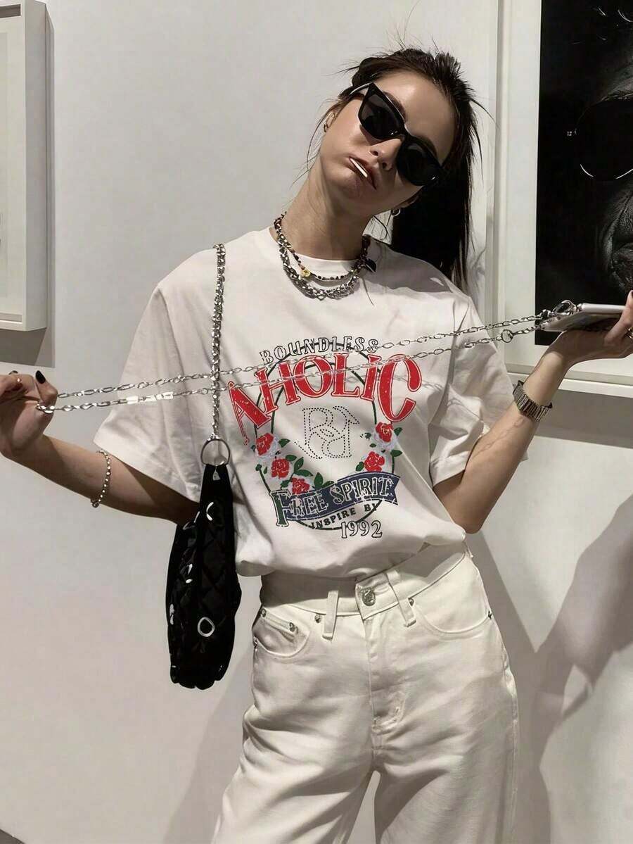 Playera holgada para mujer cuello redondo manga corta, nuevo diseño de verano con estampado de rosas y letras, estilo casual súper trendy y muy combinable.Muy cómoda para usar a diario, ideal para lucir un look fresco, sencillo y llamativo en toda ocasión. YCYC - Blanco - Ver 1