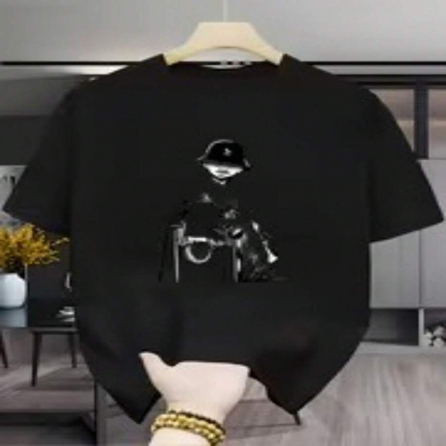 Camiseta informal de de algodón de manga corta y cuello redondo con estampado gráfico único. Cómoda y de corte regular. - Negro - Ver 1